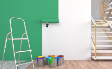 a professional cleaner cleaning an office one is mopping the floor while the other is dusting 