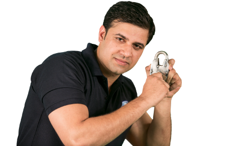 A man wearing a t shirt with a lock and a key indicating Broomberg’s privacy policy.